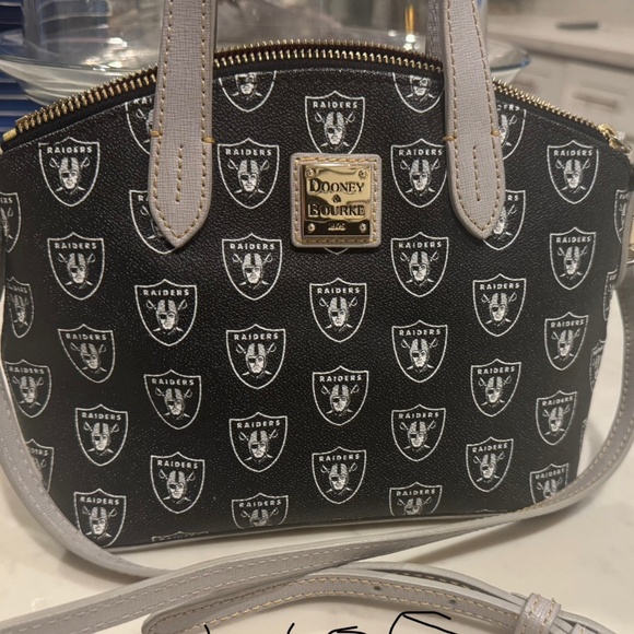Dooney & Bourke Handbags - Raider Dooney & Bourke Purse